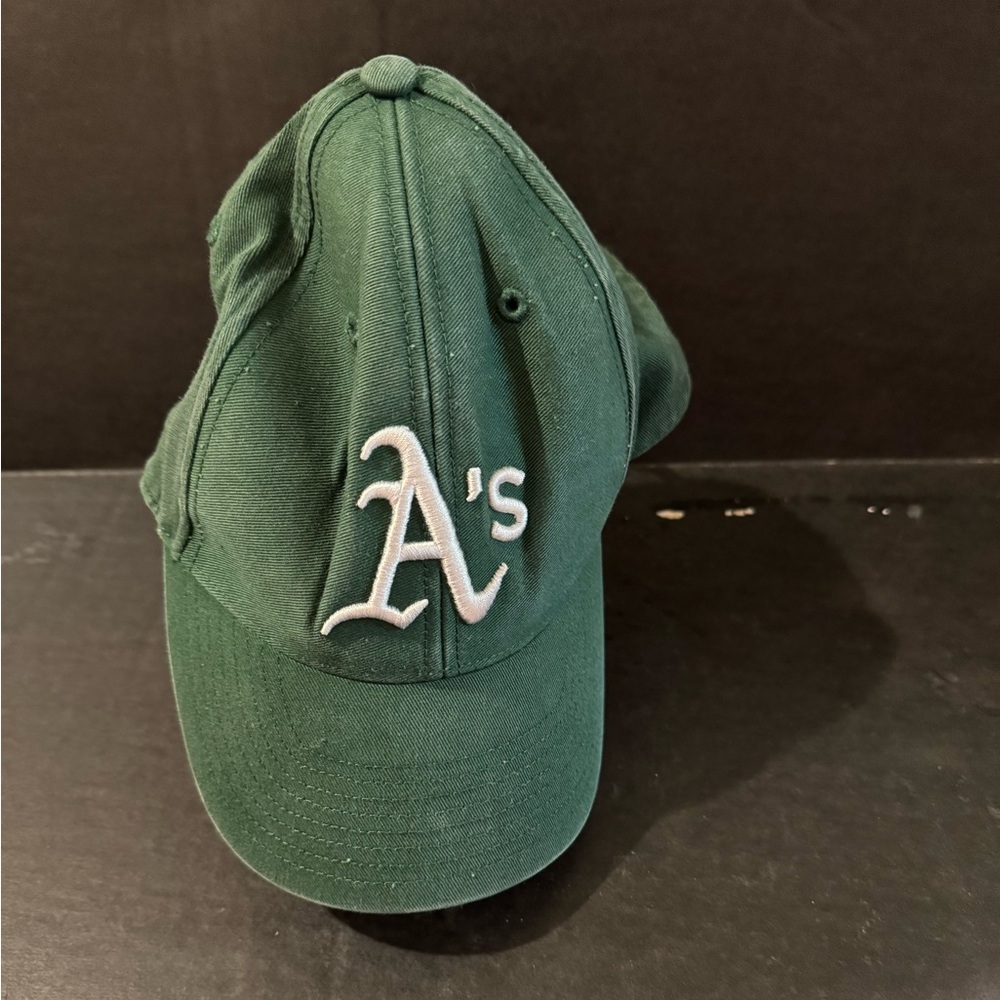 Oakland Athletics green cap
Slightly faded dark green
